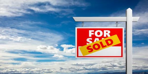 Sold sign over for sale sign against blue sky background. Real estate concept, copy space. 3d illustration